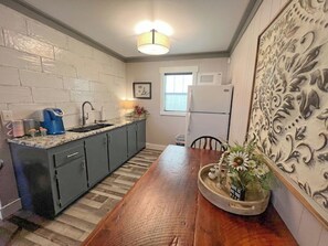 Fridge, microwave, coffee/tea maker, toaster