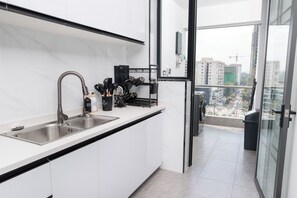 Fridge, microwave, coffee/tea maker, electric kettle