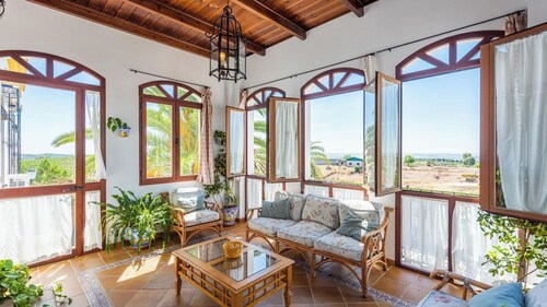 Cortijo Hacienda Nueva Lora del Río by Ruralidays