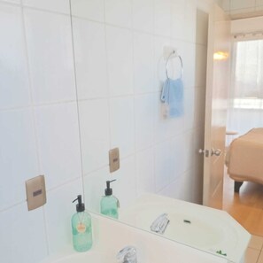 Hair dryer, towels, soap, toilet paper