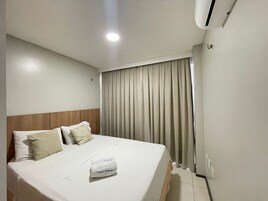 Apartamento Terraço Vista Mar | Cofres nos quartos, individualmente mobiliados