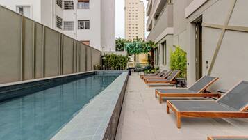 Outdoor pool, open 7:00 AM to 9:00 PM, sun loungers