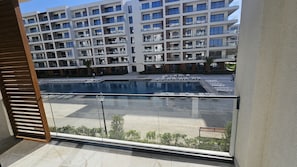 Comfort Apartment, Balcony, Pool View | Terrace/patio