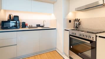 Luxury Apartment, 1 Bedroom, Balcony | Private kitchen | Coffee/tea maker, fridge, microwave, oven