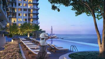 Outdoor pool, pool umbrellas, pool loungers