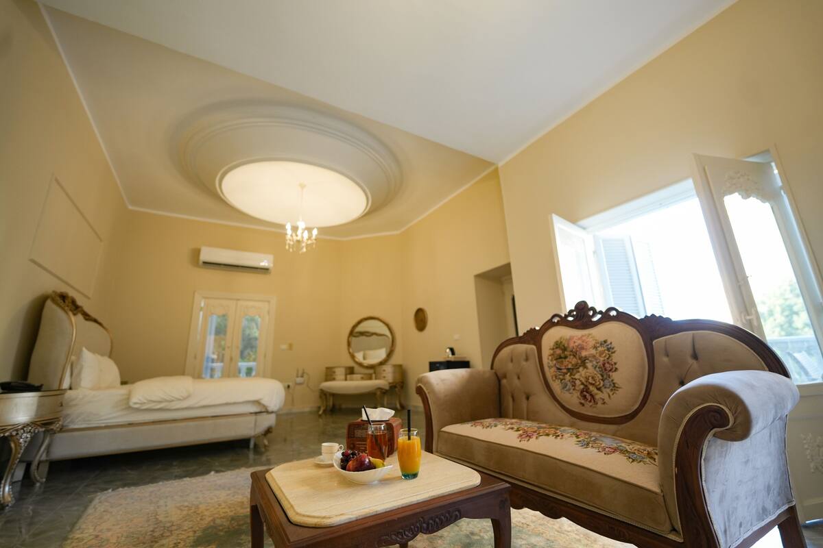 Family Suite, Balcony, Garden View | In-room safe, blackout drapes, soundproofing, iron/ironing board