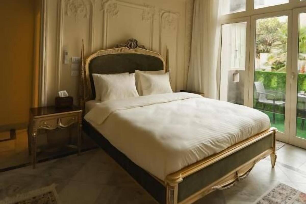Classic Double Room, Balcony, Pool View | In-room safe, blackout drapes, soundproofing, iron/ironing board