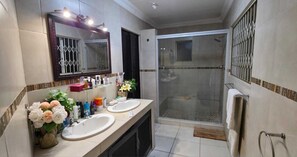 Shower, hair dryer, towels, soap