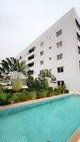 Outdoor pool, open 8:00 AM to 10:00 PM, pool umbrellas, pool loungers