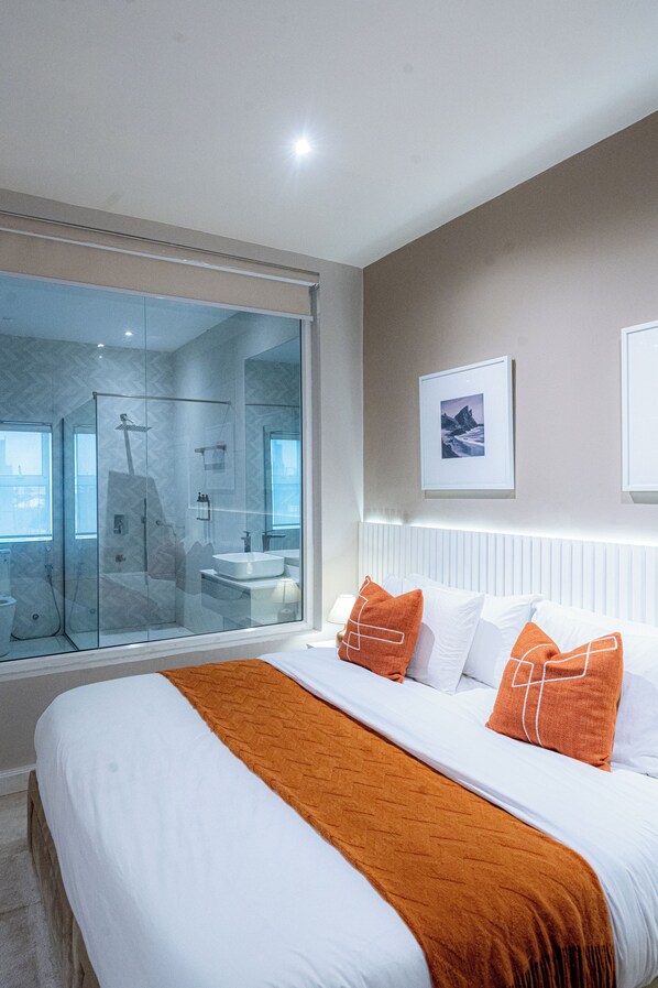 Deluxe Room, Courtyard View | Egyptian cotton sheets, premium bedding, down duvets, memory-foam beds