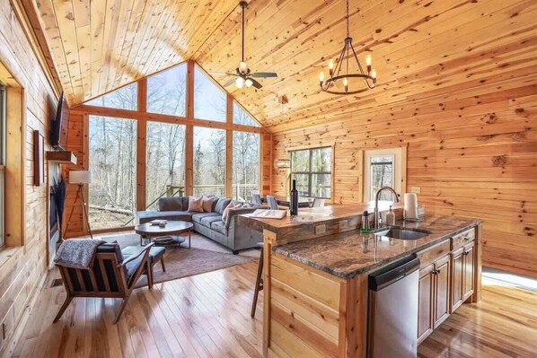 Cabin, Multiple Beds, Hot Tub (Fern Woods) | Living area | TV, fireplace