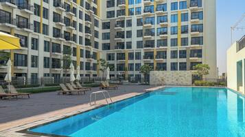 Outdoor pool, pool umbrellas, pool loungers