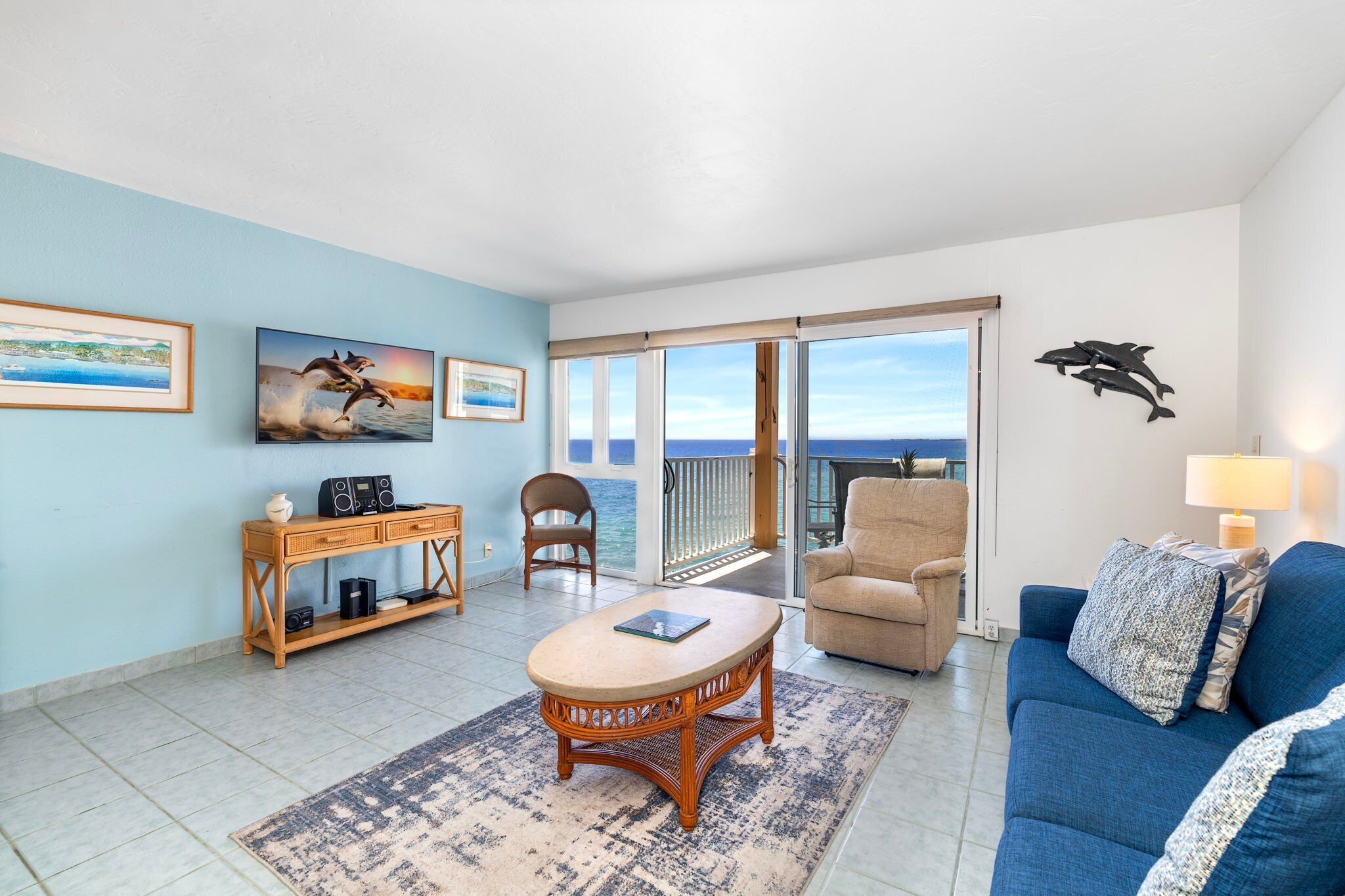 Condo, 1 King Bed with Sofa bed, Lanai, Ocean View (Sea Village 1103) | Living area | 42-inch flat-screen TV with digital channels