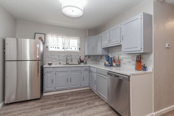 Fridge, microwave, dishwasher, coffee/tea maker