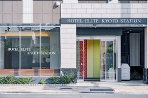A modern building with a sign reading "HOTEL ELITE KYOTO STATION".
