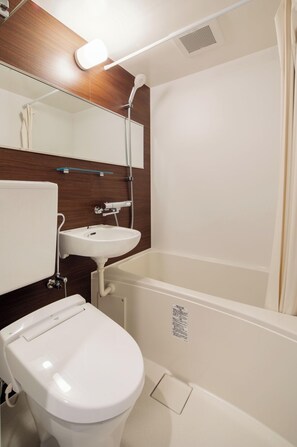 Combined shower/tub, hair dryer, slippers, towels