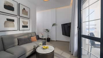 Appartement Supérieur, vue partielle sur la mer | Coin séjour