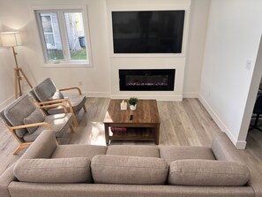 Smart TV, fireplace - 6BR Waterfront Escape | Perfect for Multi-Family Groups (Harcourt)