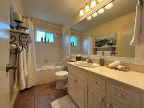 Shower, jetted tub, hair dryer, towels