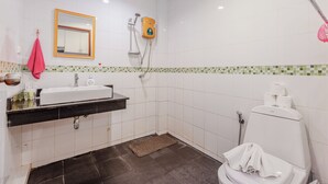 A bathroom with a white sink, mirror, and toilet. - 1BR Near Naiharn Pool&Relaxed Vibes C199 (Rawai)