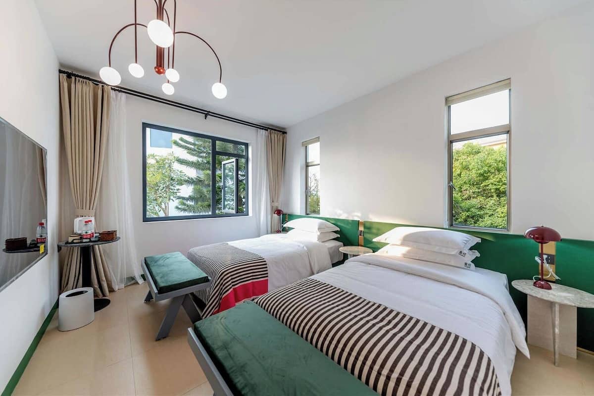 ห้องสแตนดาร์ดทวิน, วิวสวน | เครื่องนอนระดับพรีเมียม, ผ้าม่านกันแสง, ห้องเก็บเสียง, Wi-Fi ฟรี