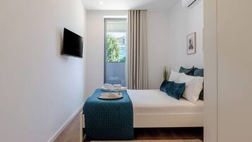 2 quartos, ferros/tábuas de passar roupa, Wi-Fi de cortesia