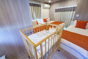 2 bedrooms, desk, iron/ironing board, travel crib