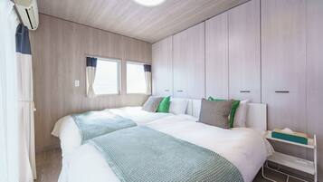 2 bedrooms, desk, iron/ironing board, travel crib