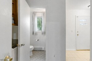 Shower, towels, soap, toilet paper