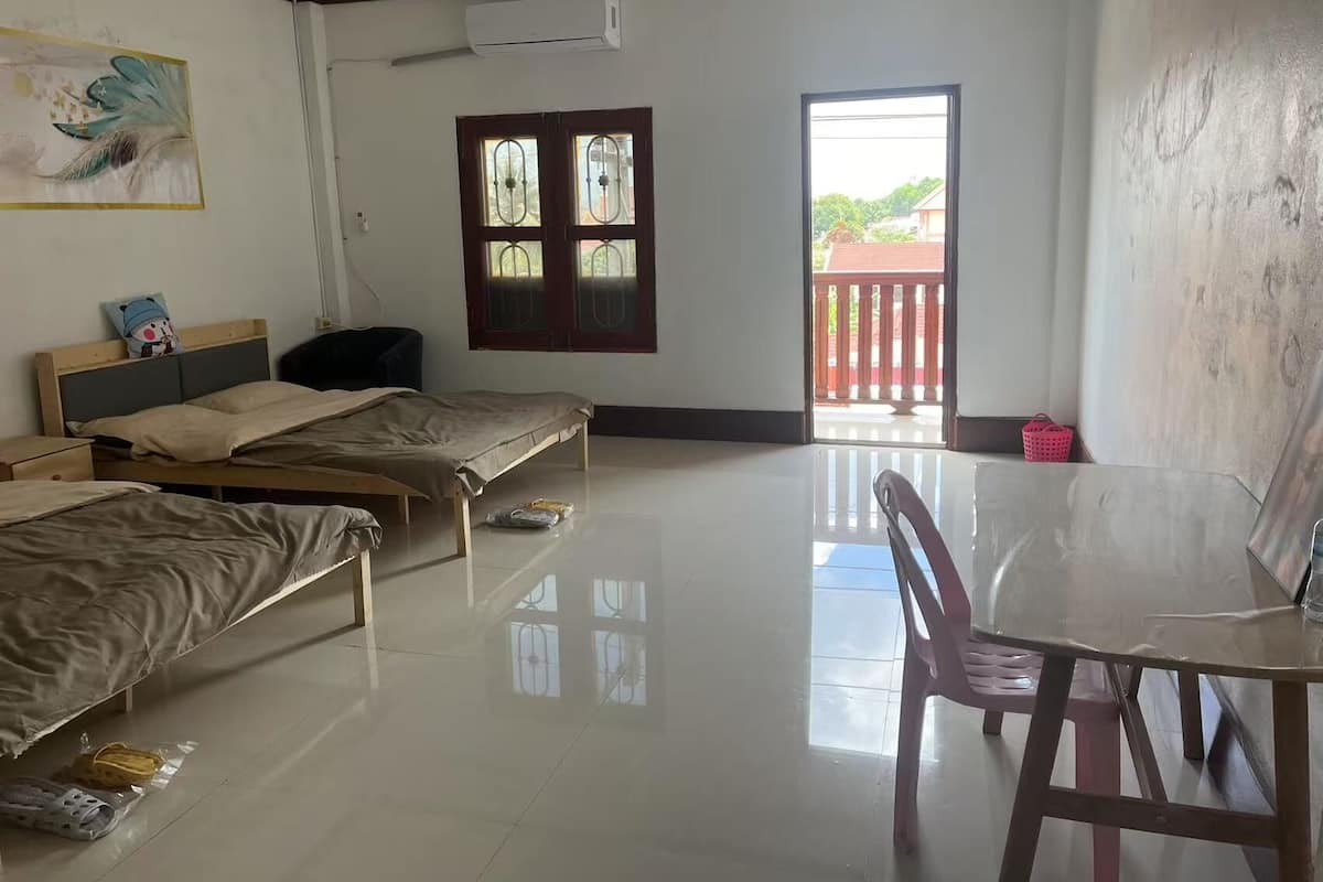 Comfort Quadruple Room, City View | Blackout drapes, soundproofing, iron/ironing board, free WiFi