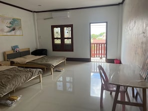Comfort Quadruple Room, City View | Blackout drapes, soundproofing, iron/ironing board, free WiFi - FUBON World (Vientiane)