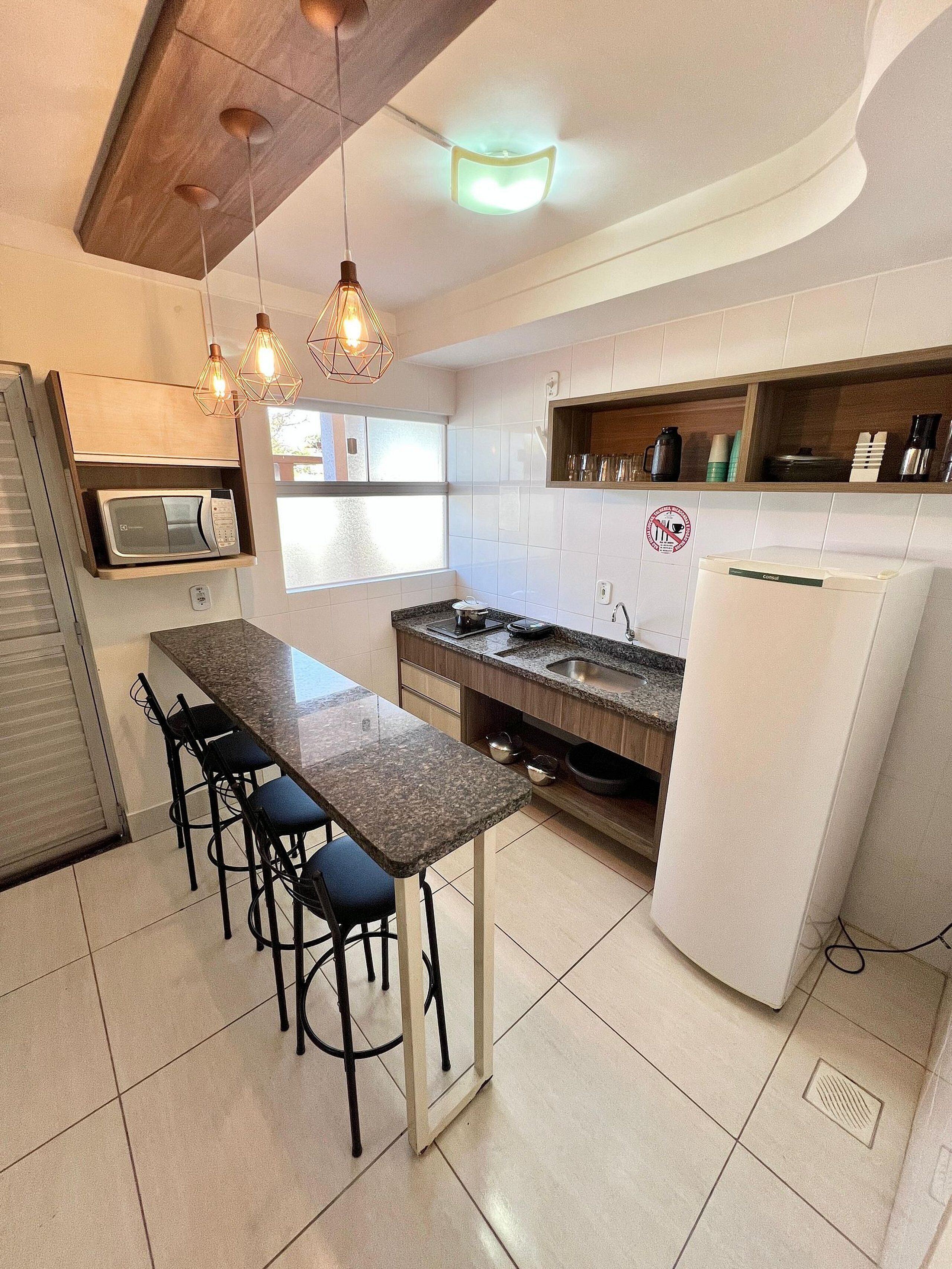 Apartment | Private kitchen | Microwave, stovetop, cookware/dishes/utensils