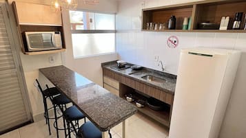 Apartment | Private kitchen | Microwave, stovetop, cookware/dishes/utensils