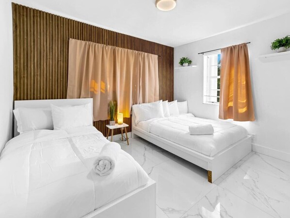 4 habitaciones, tabla de planchar con plancha, wifi y ropa de cama 