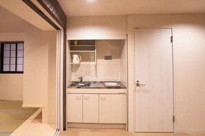Fridge, microwave, stovetop, cookware/dishes/utensils