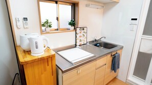 Fridge, microwave, stovetop, cookware/dishes/utensils