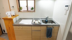 Fridge, microwave, stovetop, cookware/dishes/utensils