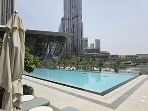 Pool - Sky-High 1BR , Perfectly Located Near Dubai Opera and Burj Park and Dubai Mall (Dubai)
