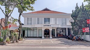 A two-story building with the name "ASTERIA" prominently displayed above the entrance.