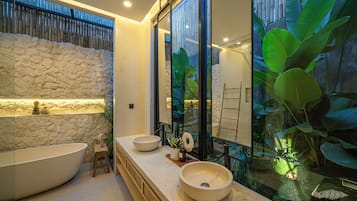 Family Villa, Pool View | Bathroom | Hair dryer, towels, soap, shampoo