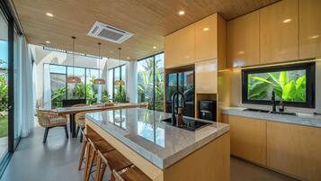 Family Villa, Pool View | Private kitchen | Fridge, oven, stovetop, coffee/tea maker
