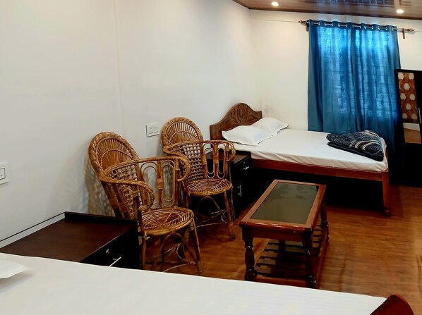 Deluxe Quadruple Room, Balcony | Desk, free WiFi