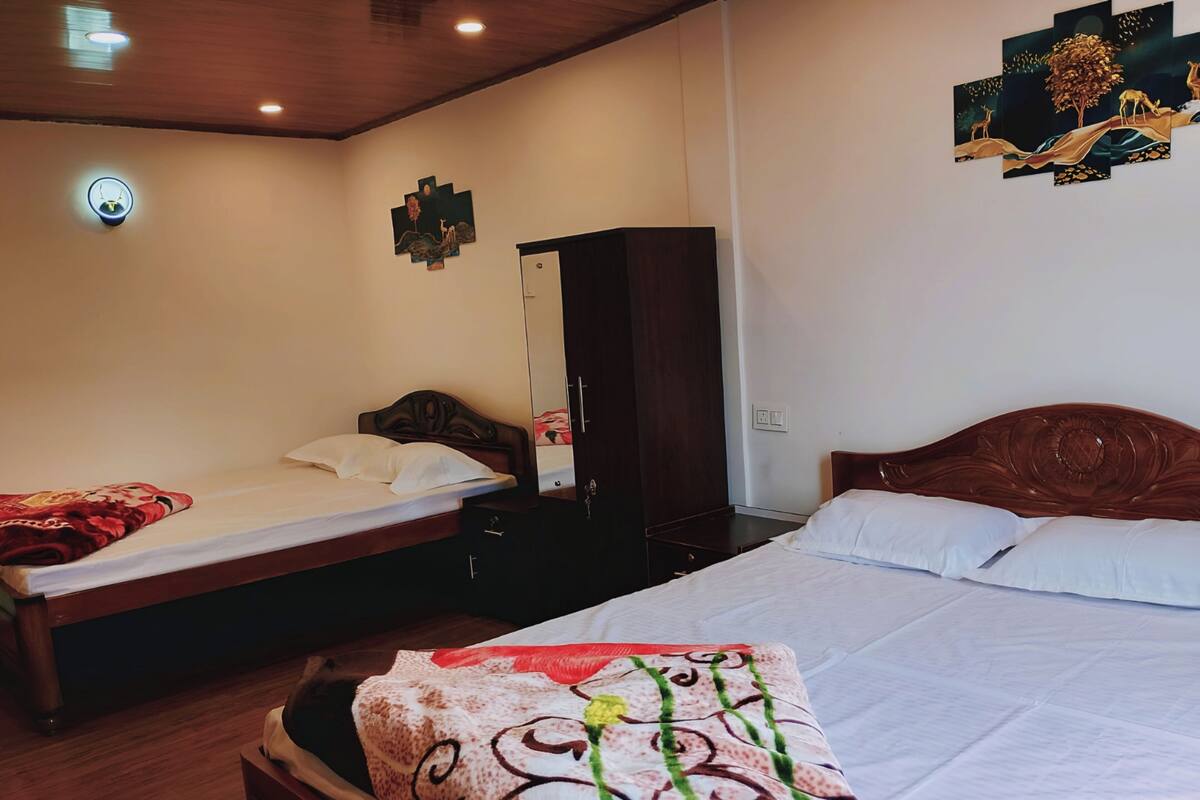 Deluxe Quadruple Room, Balcony | Desk, free WiFi