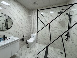 Shower, hair dryer, towels, soap