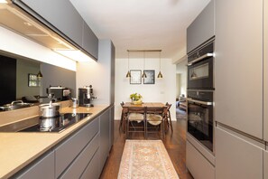 Comfort Apartment | Private kitchen | Fridge, oven, stovetop, electric kettle