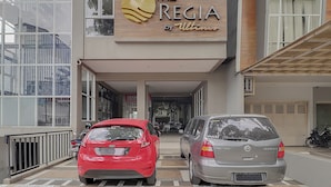 A building with a sign reading "The Regia by Ultimo." - Capital O 94727 Regia Cihampelas Ciwalk (Bandung)