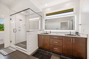 Shower, hair dryer, towels, shampoo