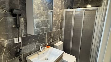 Shower, free toiletries, hair dryer, soap