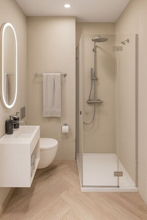 Shower, hair dryer, towels, soap