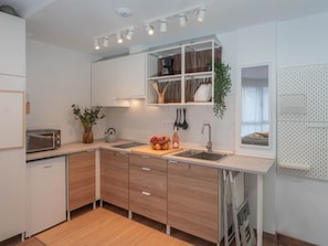 Fridge, microwave, coffee/tea maker, toaster